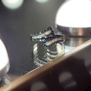 Blue stone and white diamond ring